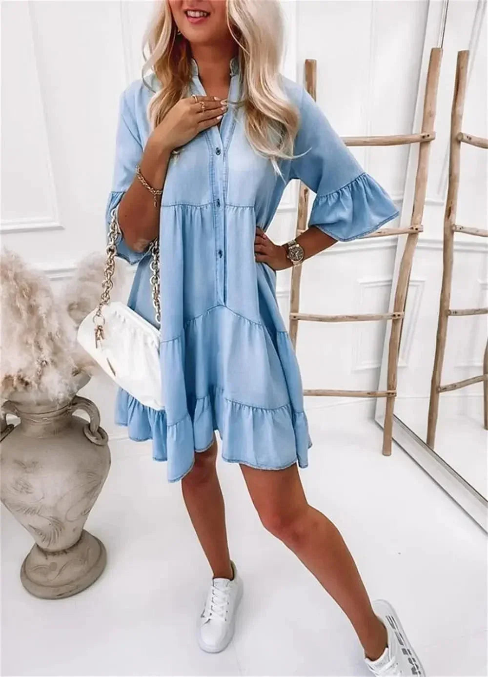Mini dress in light blue denim with ruffles 3/4 sleeves