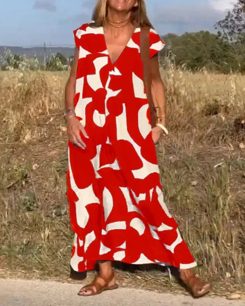 Maxi dress for women with V-neck and flowing patterns