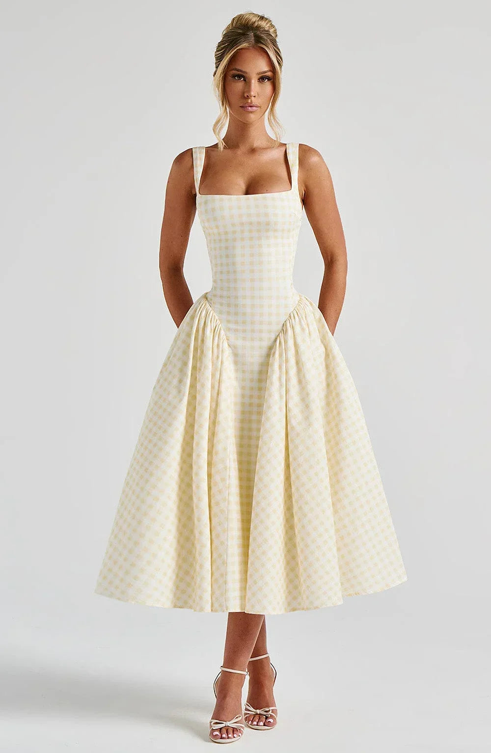 Flared mid-length dress for women with checks and wide straps